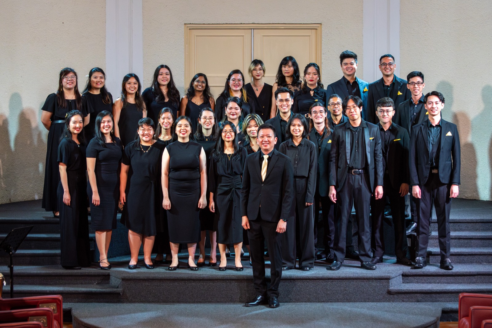 Formal choir group photo taken during Sing on 3 choir concert.