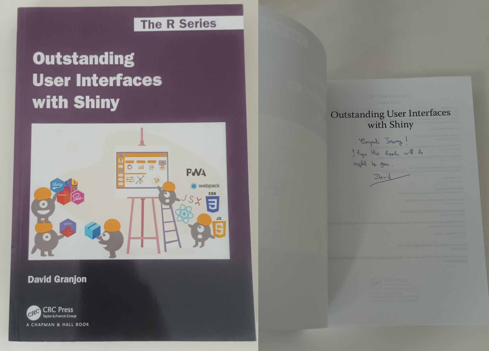 Picture of an autographed book titled Outstanding User interfaces with Shiny by David Granjon that I have won during the useR! 2024 conference.