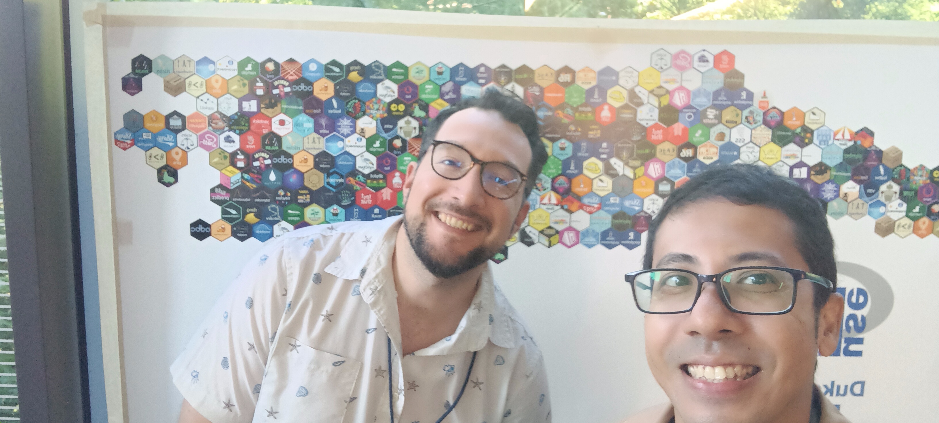 Picture of me and Luis in the useR! 2025 conference.